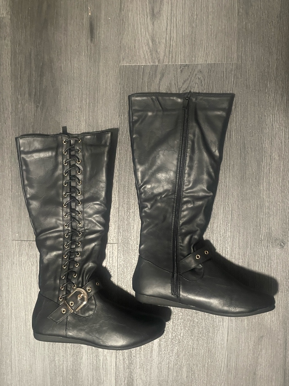 Black Knee High Riding Boots with decorative Buckle Strap and Lace Up side